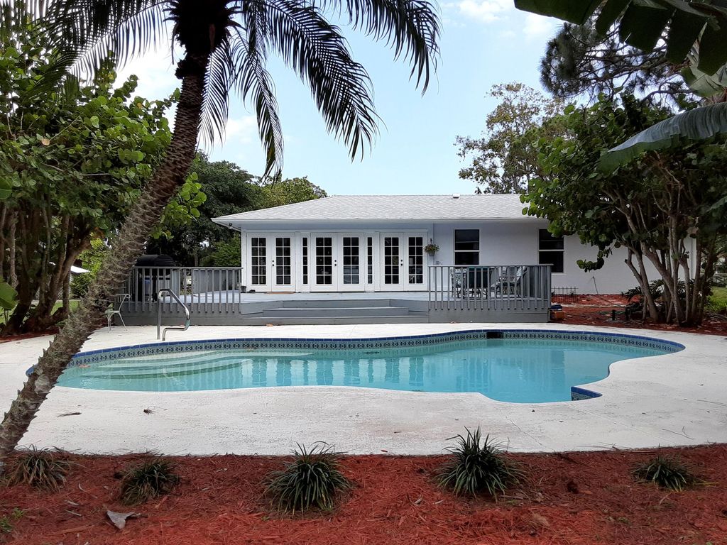 Photo of 8295 S Virginia Avenue, Palm Beach Gardens, FL 33418 (MLS # R10789197)