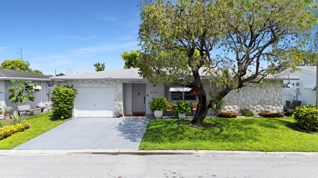 Photo of 6995 NW 10TH Court, Margate, FL 33063 (MLS # B26077241)