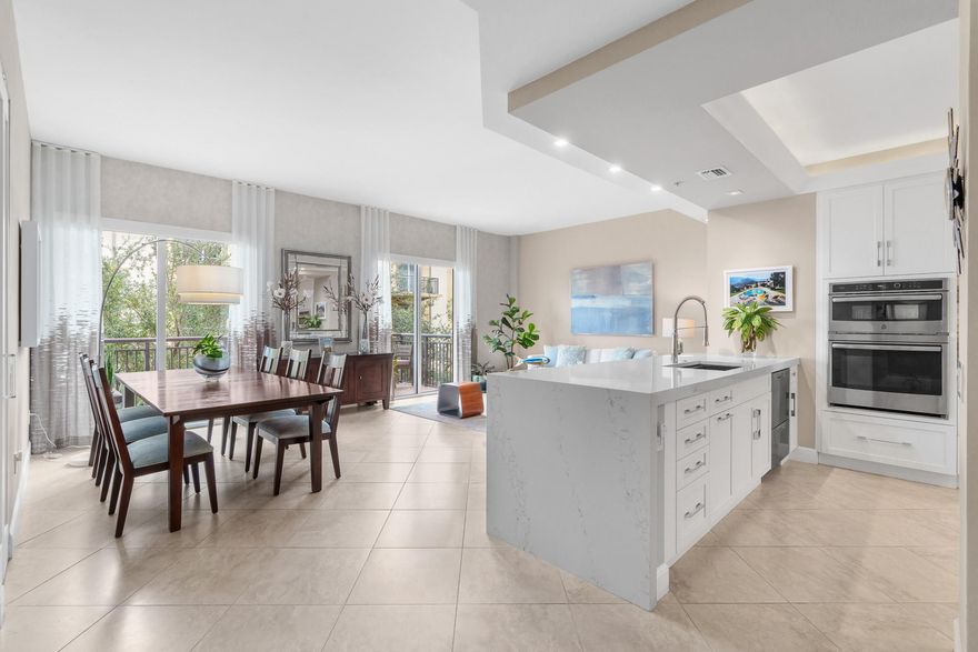 This upscale custom-renovated smart home is the epitome of modern luxury living. An open-concept floor plan maximizes natural light & provides a seamless flow between living, dining & kitchen areas. Kitchen offers high-end appliances, quartz countertops, abundant storage & custom cabinetry. The primary suite is a tranquil retreat, with a spacious walk-in closet and an en-suite spa like bathroom complete with a luxurious soaking tub, a glass-enclosed shower & double vanity sinks. It's the perfect space to unwind & rejuvenate. A convenient home office, ambient lighting, thoughtfully designed interiors, cutting-edge technology & prime location make this a rare find. A/C and W/D both new in 2023. Resort like community, gated, pet friendly, EV charging and more.