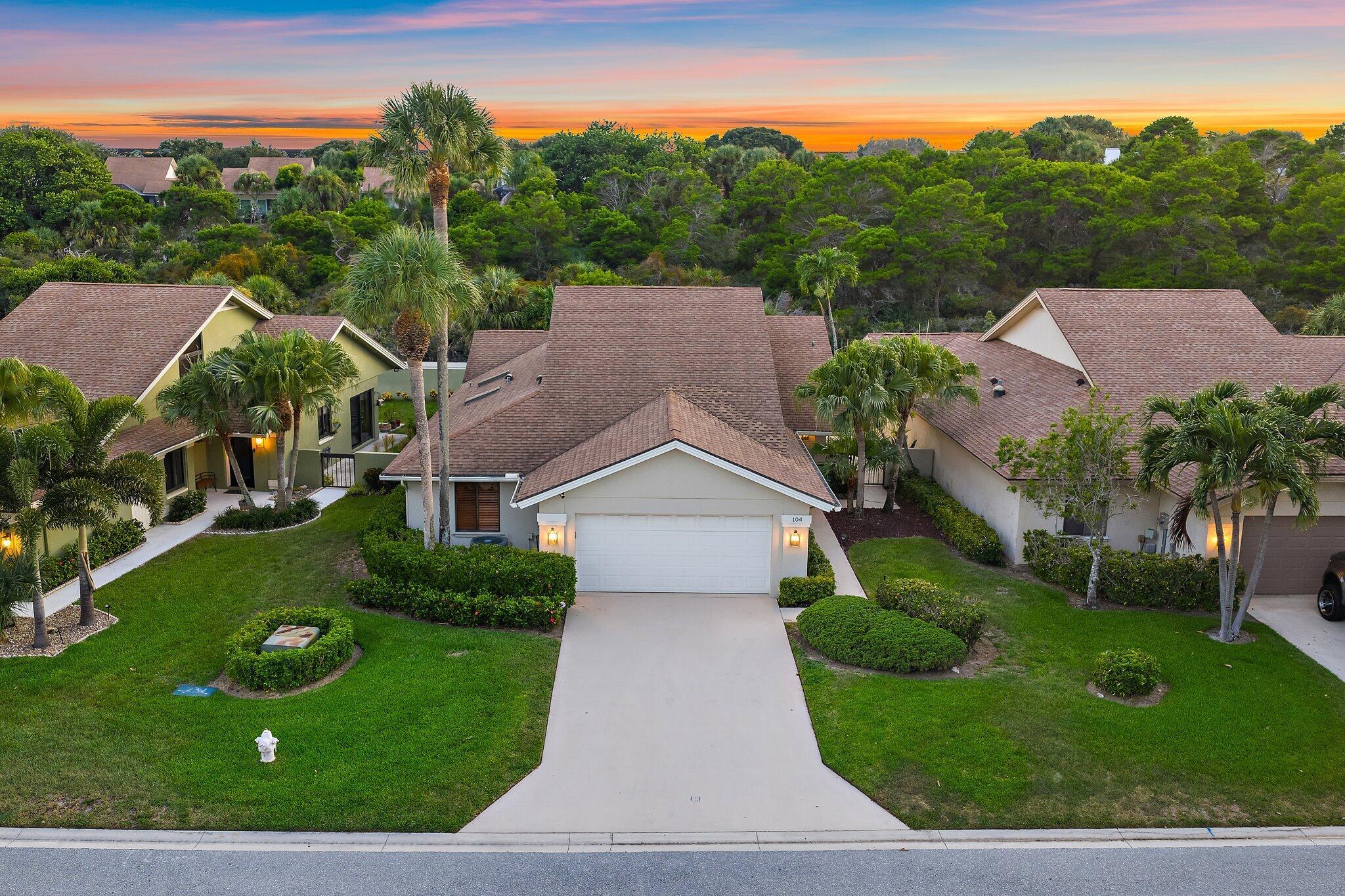 Just steps from the beach, 104 Sand Pine Drive sits on one of the most coveted lots in Jupiter's iconic Bluffs neighborhood. This 3-bedroom, 2-bath home also features a versatile bonus loft above the third bedroom, perfect for an office or guest space. Backing to a peaceful preserve, the property offers the ideal balance of privacy and convenience while being among the closest homes to the ocean. Meticulously maintained in its original condition, it provides the perfect canvas to reimagine your dream beach retreat. A beautifully resurfaced pool with new heater makes the backyard a true oasis, surrounded by lush natural views. This is a rare opportunity to secure a premium Bluffs property with unbeatable walkability, lasting privacy, and incredible potential.