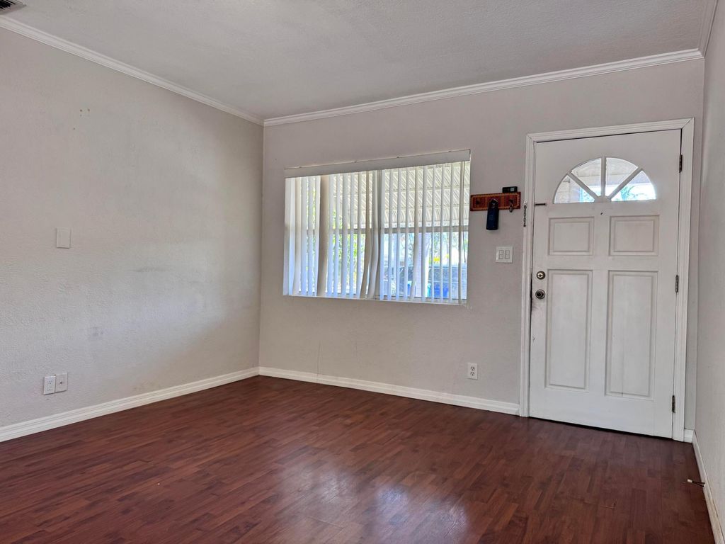Photo of 1015 Macy Street, West Palm Beach, FL 33405 (MLS # R11156170)