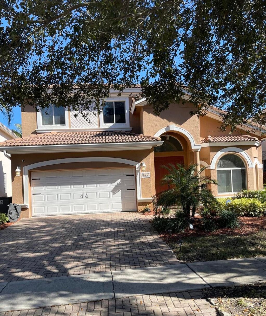 Photo of 870 Gazetta Way, West Palm Beach, FL 33413 (MLS # R11129683)