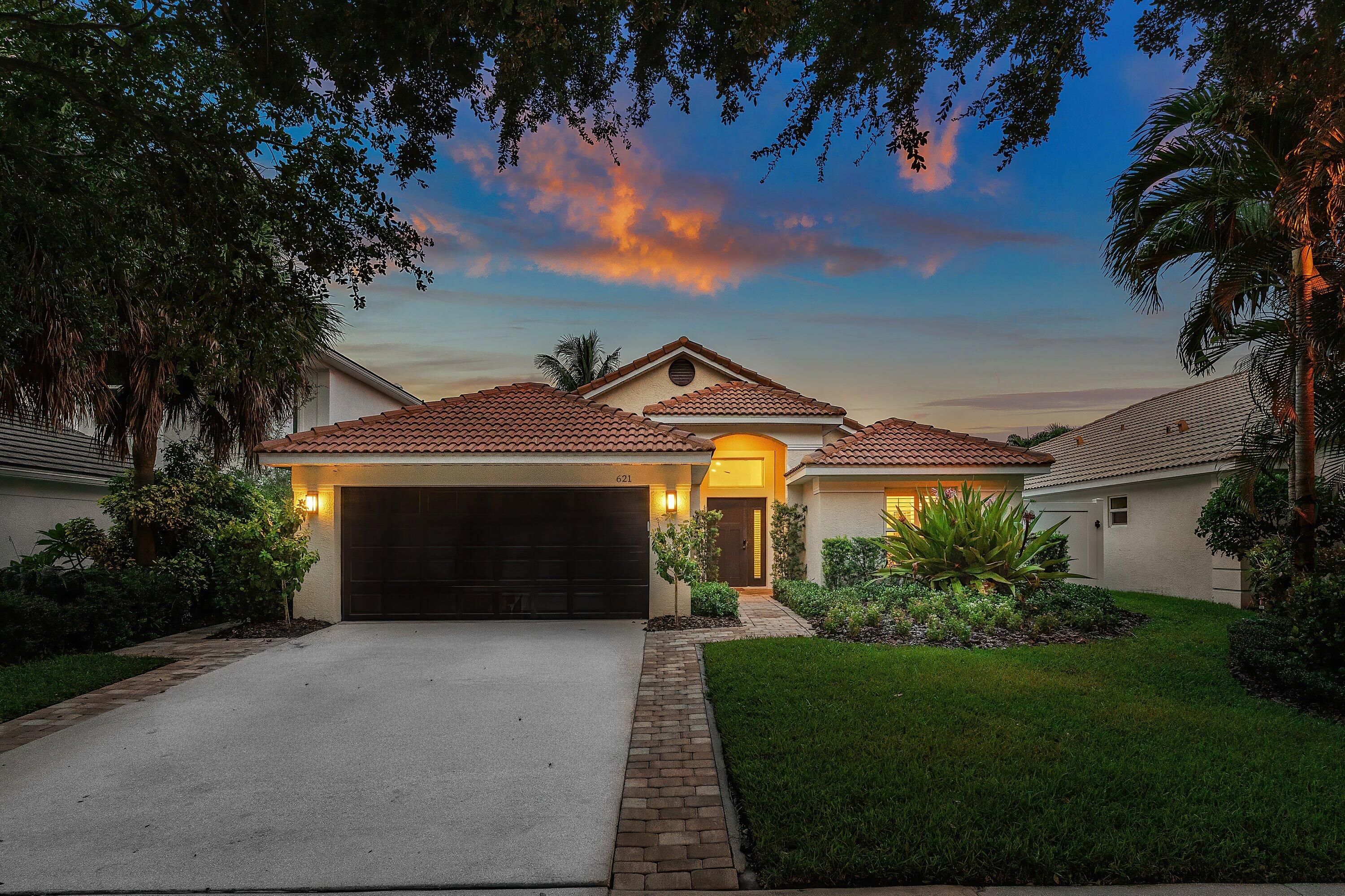 Discover the perfect blend of modern style and coastal living in this beautifully renovated 3BR/2BA home, ideally located in a gated community east of I-95 and just minutes to Downtown Delray Beach. Offering 1,668 sq. ft. under air (2,232 total), this residence is designed for both comfort and lifestyle--with a sparkling new saltwater pool and spa, impact windows throughout, and rare canal frontage with direct access to Lake Ida.Step inside to vaulted ceilings, wood-look porcelain tile, recessed lighting, and plantation shutters that give the home a chic, fresh feel. The open layout flows easily from the family room--with a custom dry bar featuring quartz counters, glass cabinetry, brushed gold accents, designer backsplash, and a wine cooler--
