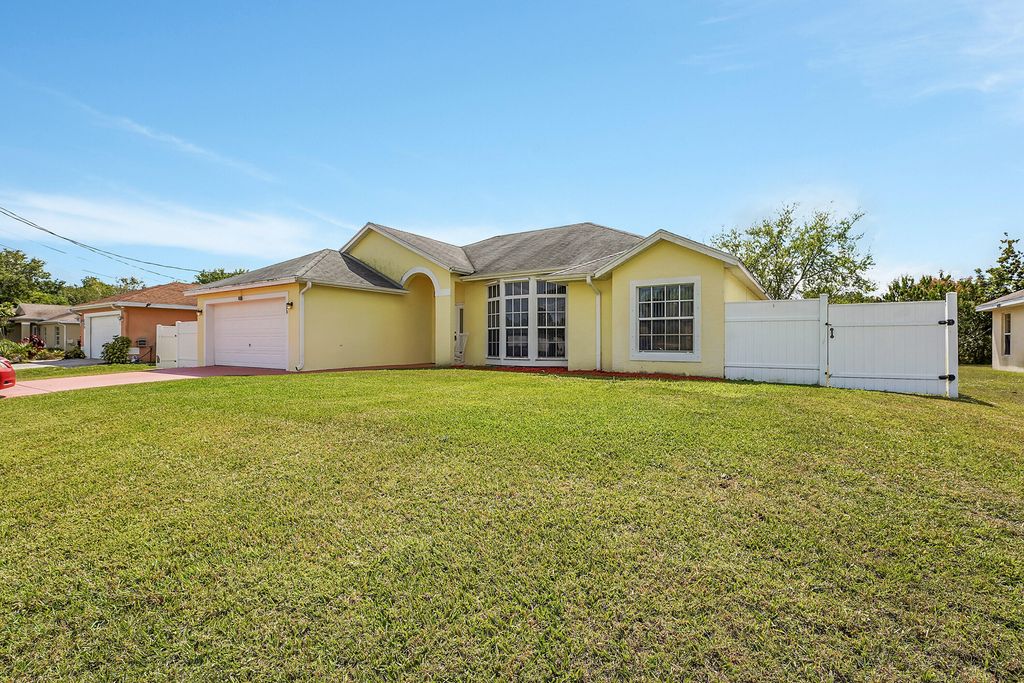 Photo of 770 SW Jordin Avenue, Port Saint Lucie, FL 34953 (MLS # R10967177)