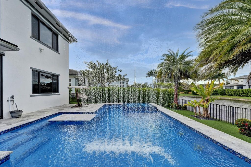 Photo of 10915 Moore Drive, Parkland, FL 33076 (MLS # F10529104)