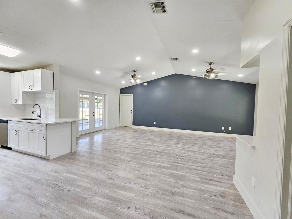 Photo of 13830 62nd Court N, West Palm Beach, FL 33412 (MLS # R10983027)