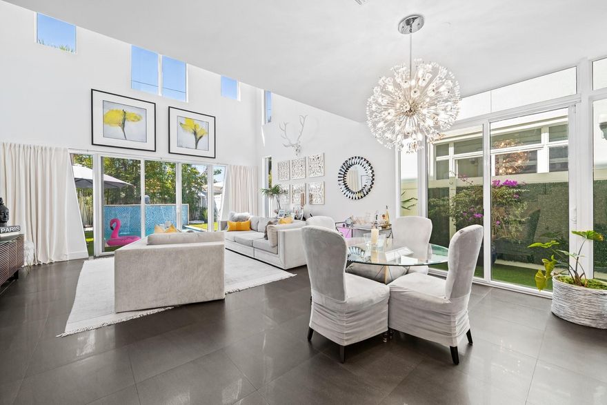Priced to Sell! If you are Looking for a Home that feels like new construction without the new-construction price tag. This impeccable and bright 3-beds + Loft, 2.5-baths townhouse, offers an open-concept layout with soaring 20-ft ceiling, expansive impact glass. No HOA, No rental restrictions. Set on a high-elevation, spacious 3,374 SF lot. Brand new AC system. The modern kitchen features stainless appliances, quartz countertops and huge pantry. 2-car garage with brand-new epoxy flooring. Oversized private driveway. The private backyard is an entertainer’s dream, with saltwater heated pool & stunning waterfall feature. All bedrooms offer private terraces. Minutes from the Galleria Mall, Las Olas, Downtown Ft Lauderdale, Wilton Manors, Parks, Tennis courts and the beautiful sandy Beaches.
