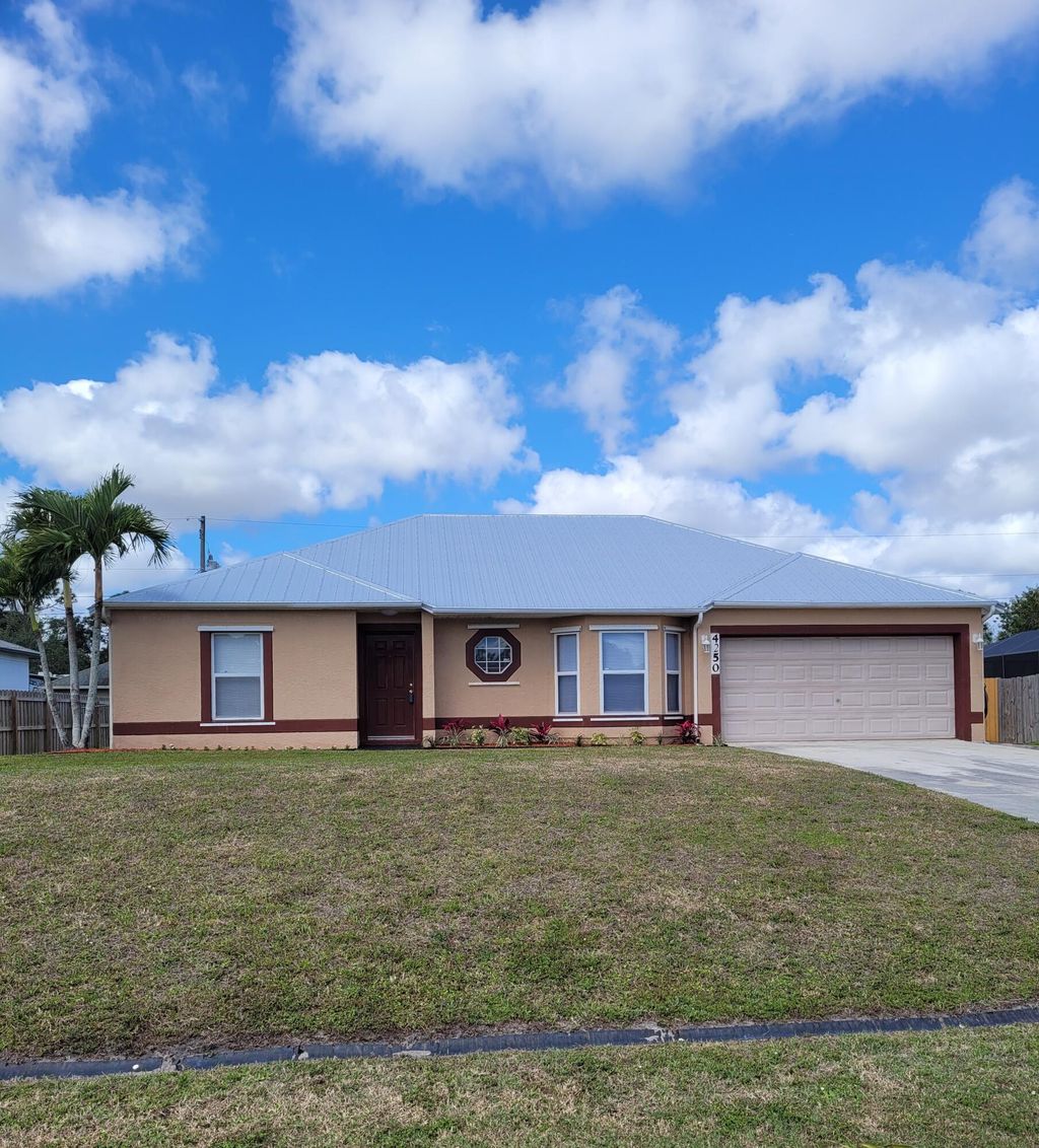 Photo of 4250 SW Mcclellan Street, Port Saint Lucie, FL 34953 (MLS # R10779222)