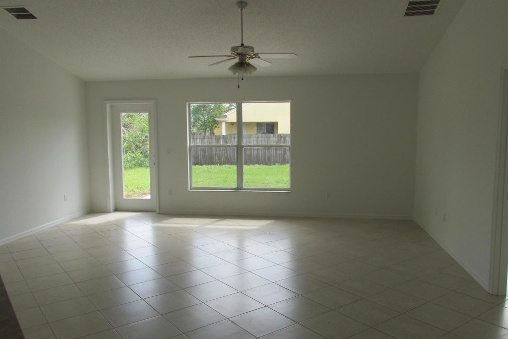 Photo of 1781 SW Dove Lane, Port Saint Lucie, FL 34953 (MLS # R11001338)