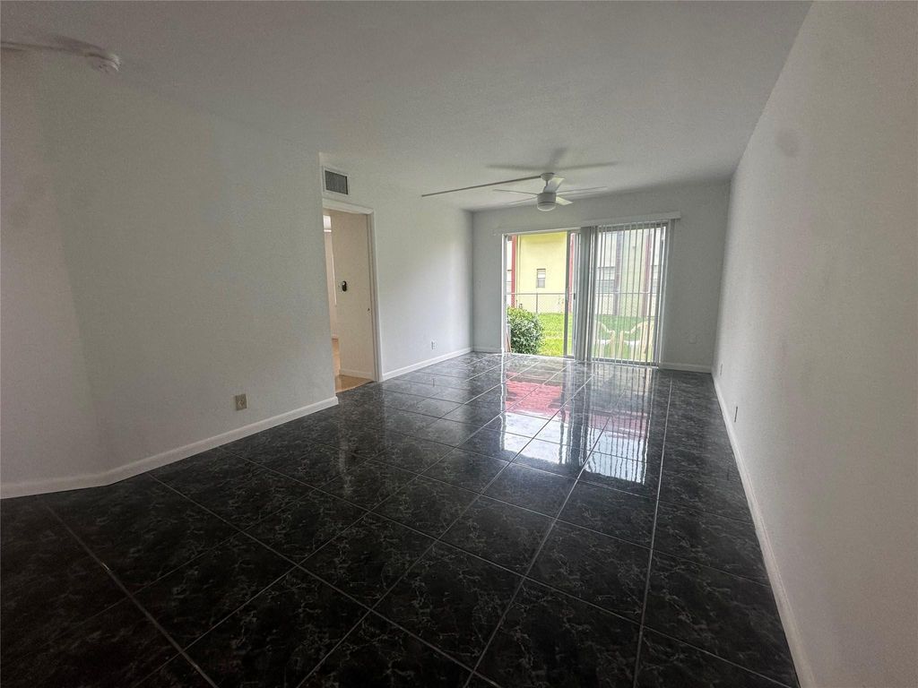 Photo of 3212 NW 103rd Terrace #107-B, Coral Springs, FL 33065 (MLS # F10549320)
