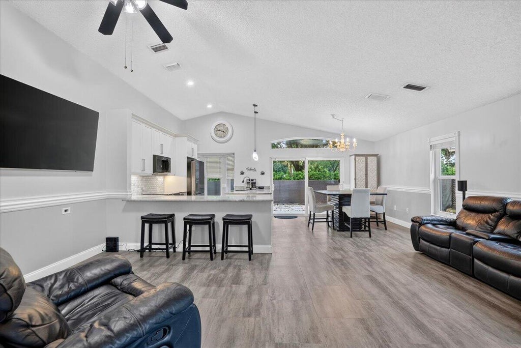 Photo of 5435 NW 50th Court, Coconut Creek, FL 33073 (MLS # B26074414)