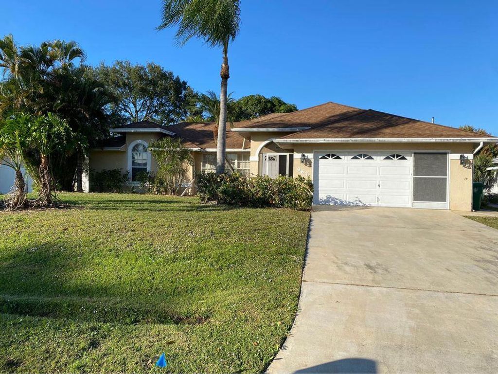 Photo of 967 SE Belfast Avenue, Port Saint Lucie, FL 34983 (MLS # R10781439)
