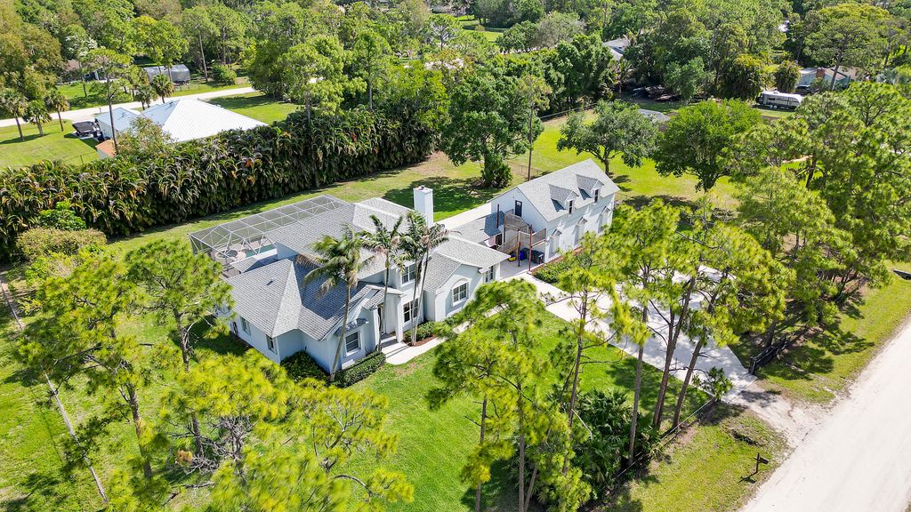 Photo of 13747 55th Road N, West Palm Beach, FL 33411 (MLS # B26020168)