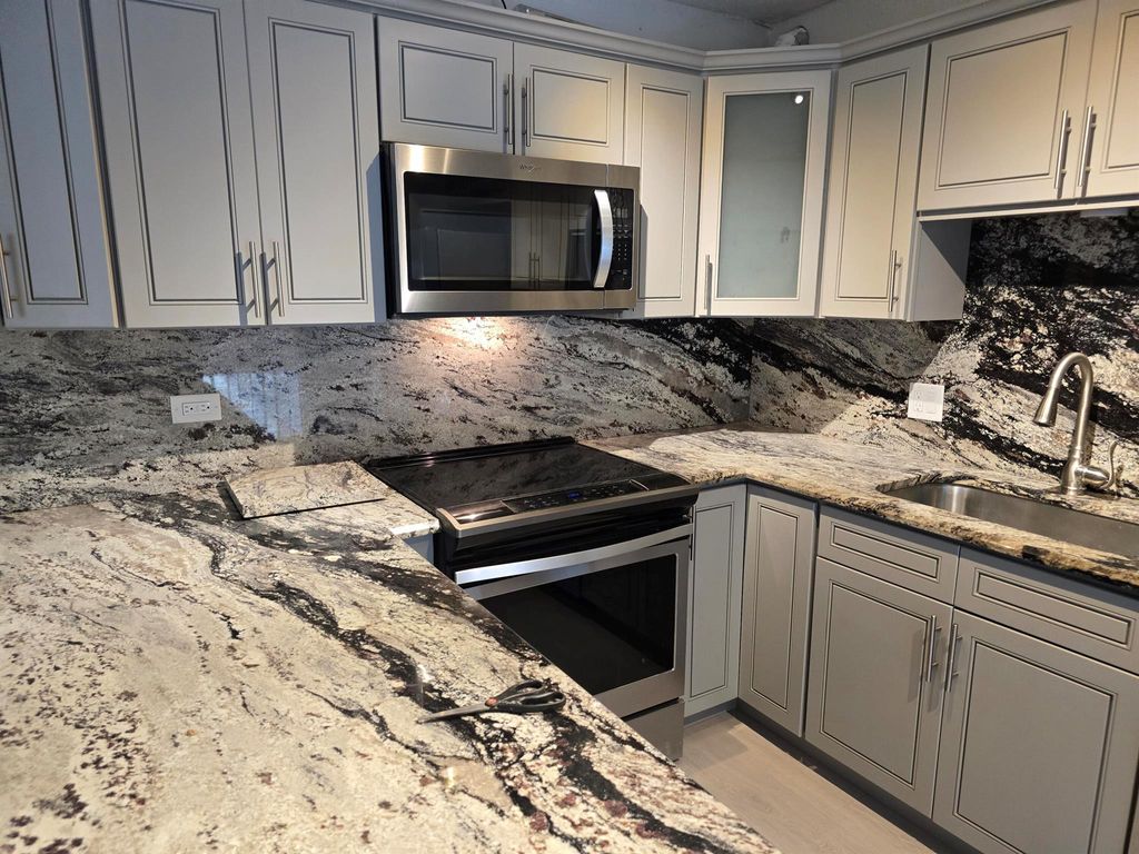 Photo of 1480 Masters Circle #171, Delray Beach, FL 33445 (MLS # R11110952)