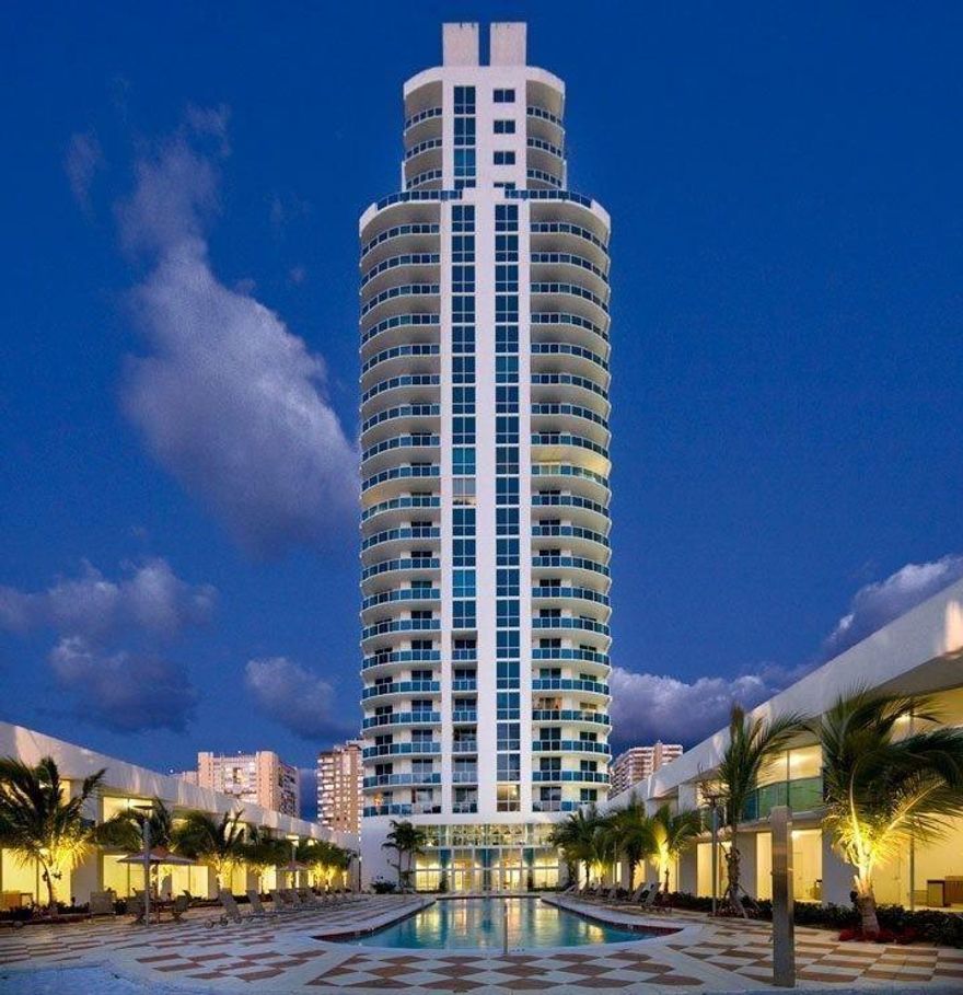 New, fully furnished 1 bedroom, 1 bathroom plus den apartment is just steps to the beach. It has spectacular views to the ocean and Intracoastal, panoramic floor to ceiling windows, one garage parking space. Building features: Fitness and business center, heated swimming pool, hot tub jacuzzi, conference room, club house, social room, billiard, table tennis, private marina. Walking distance to all conveniences, shops, restaurants, entertainment, luxury shopping at Aventura and Bal Harbour, golf clubs, horse racing at Gulfstream Park Casino and more. Easy access to major highways, 15 minutes to ft. Lauderdale international airport and port Everglades, 30 minutes to Mia international airport, downtown & Miami beach. For information and showing, please see the broker remarks!!