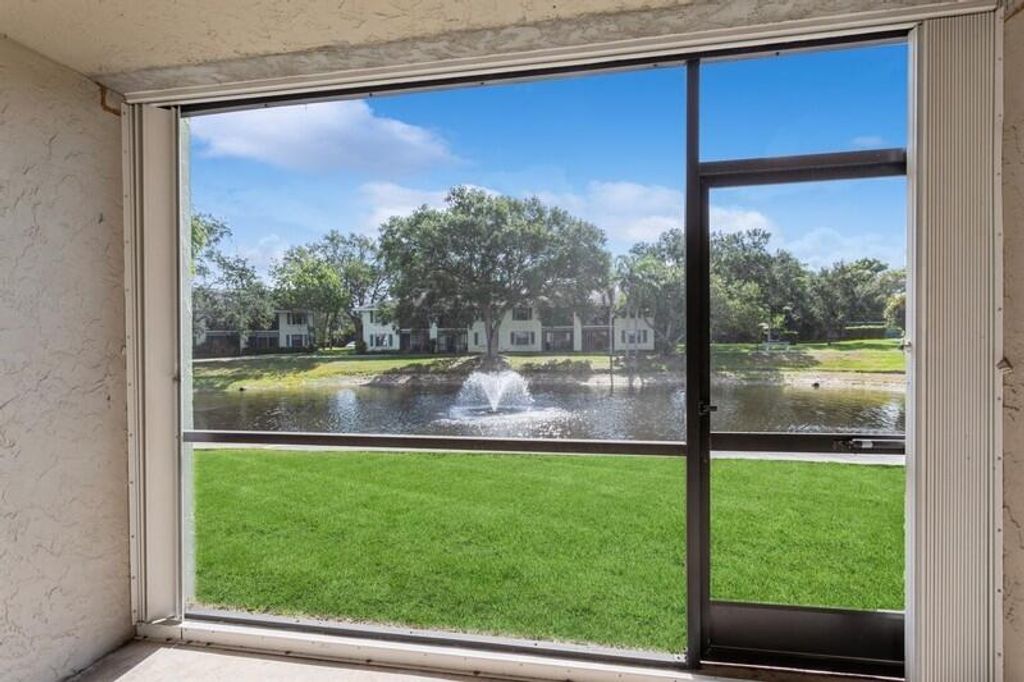 Photo of 701 Sabal Ridge Cir #C, Palm Beach Gardens, FL 33418 (MLS # R11082835)