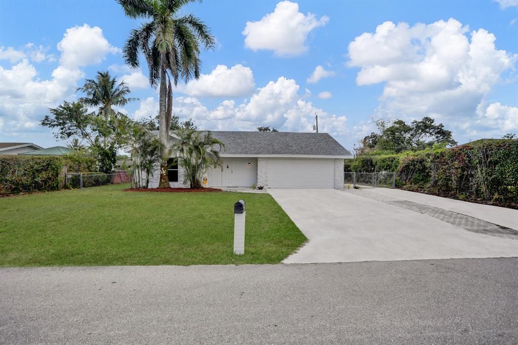 Photo of 3482 Palomino Drive, Lake Worth, FL 33462 (MLS # R10881266)
