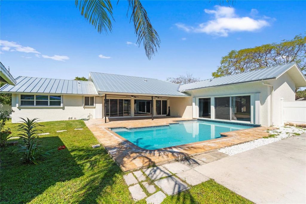 Photo of 698 NW 12th Road, Boca Raton, FL 33486 (MLS # R11113474)