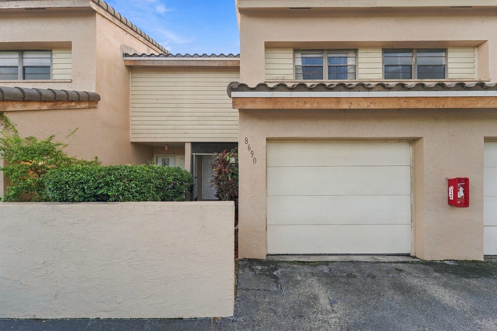Photo of 8690 NW 40th Street, Coral Springs, FL 33065 (MLS # B26079055)