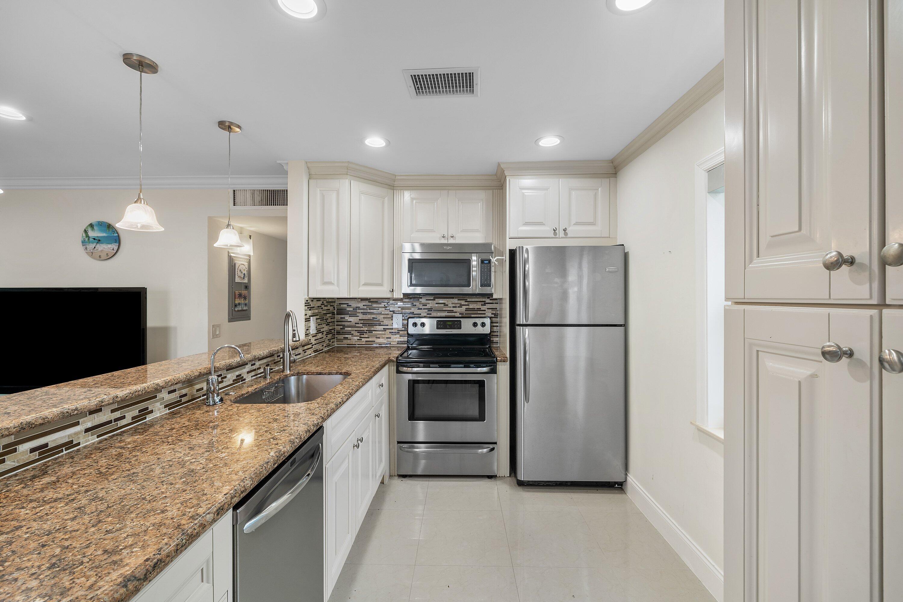 KINGS POINT BURGUNDY COND - Residential