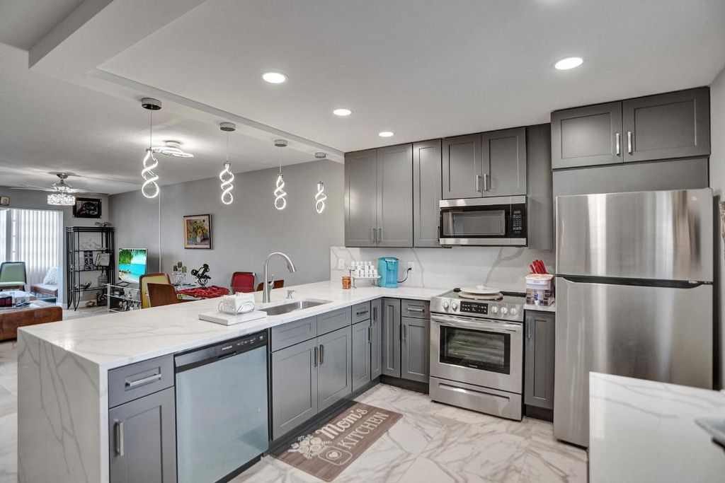 Photo of 130 NE 26th Avenue #3070, Boynton Beach, FL 33435 (MLS # R11072289)