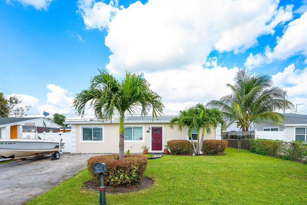 Photo of 3018 Giuliano Avenue, Lake Worth, FL 33461 (MLS # R10956709)