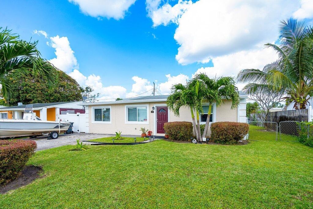 Photo of 3018 Giuliano Avenue, Lake Worth, FL 33461 (MLS # R10956709)