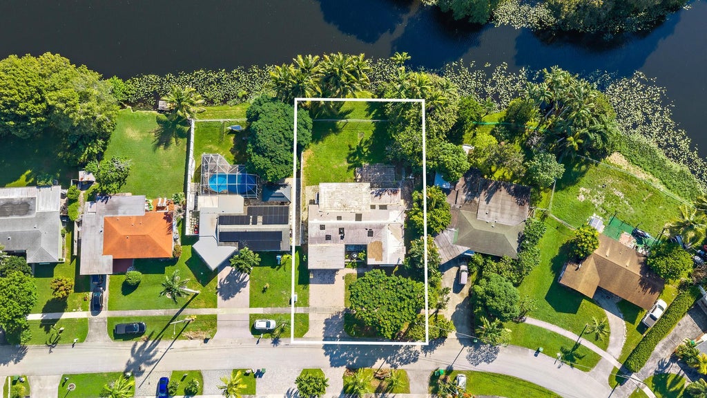 Photo of 216 TAM O SHANTER Drive, Palm Springs, FL 33461 (MLS # B26088883)
