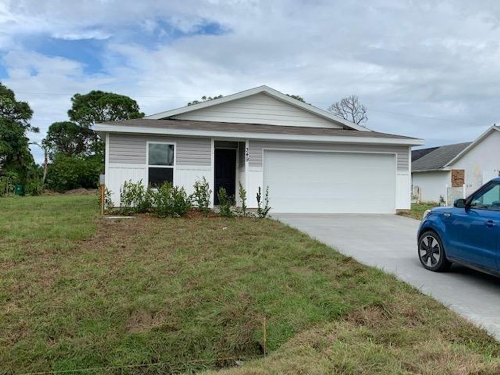 Photo of 349 NE Glentry Avenue, Port Saint Lucie, FL 34983 (MLS # R10952532)