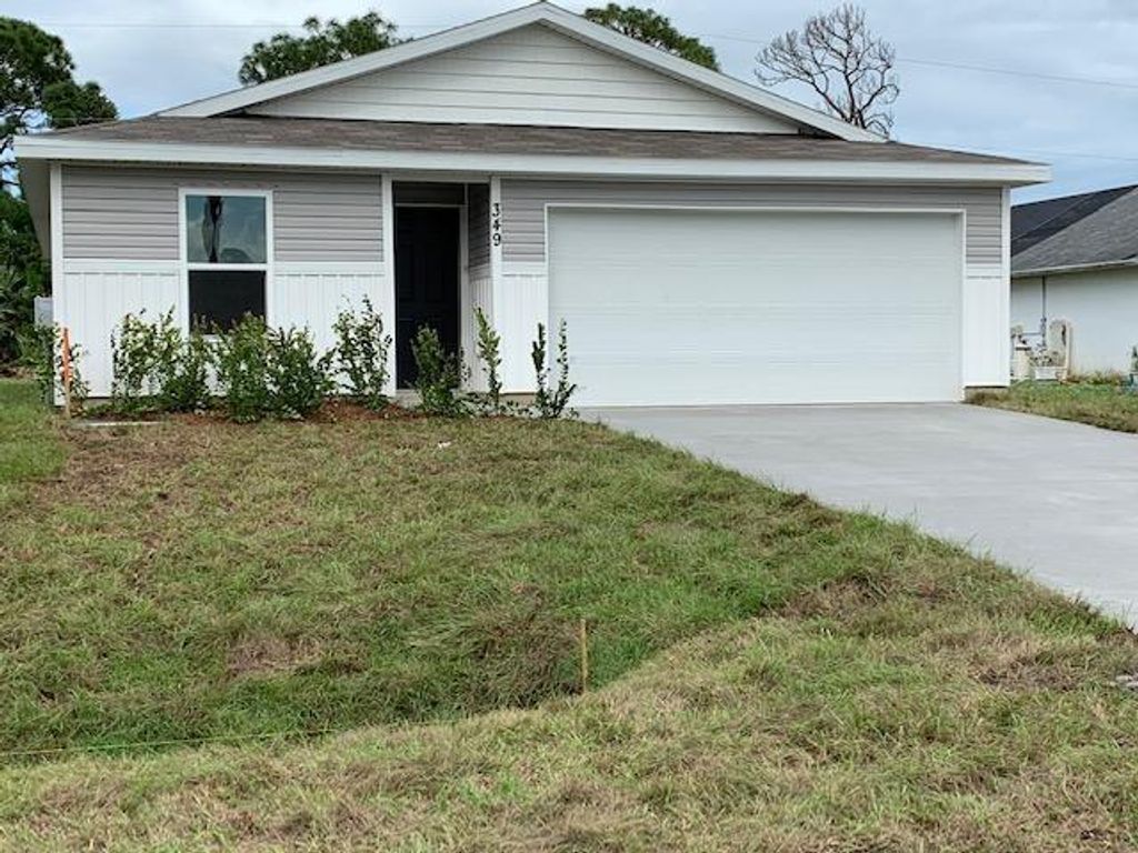 Photo of 349 NE Glentry Avenue, Port Saint Lucie, FL 34983 (MLS # R10952532)