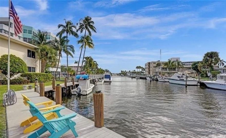 Amazing walkability from this 2 bedroom unit on a no fixed bridge canal, super close to the beach. Located one canal over from, or steps away from Shooters on the intracoastal. AC replaced in 2023. Cash only. No age restrictions. Dockage for boats up to 25 feet in length. $200 a month dock fees.