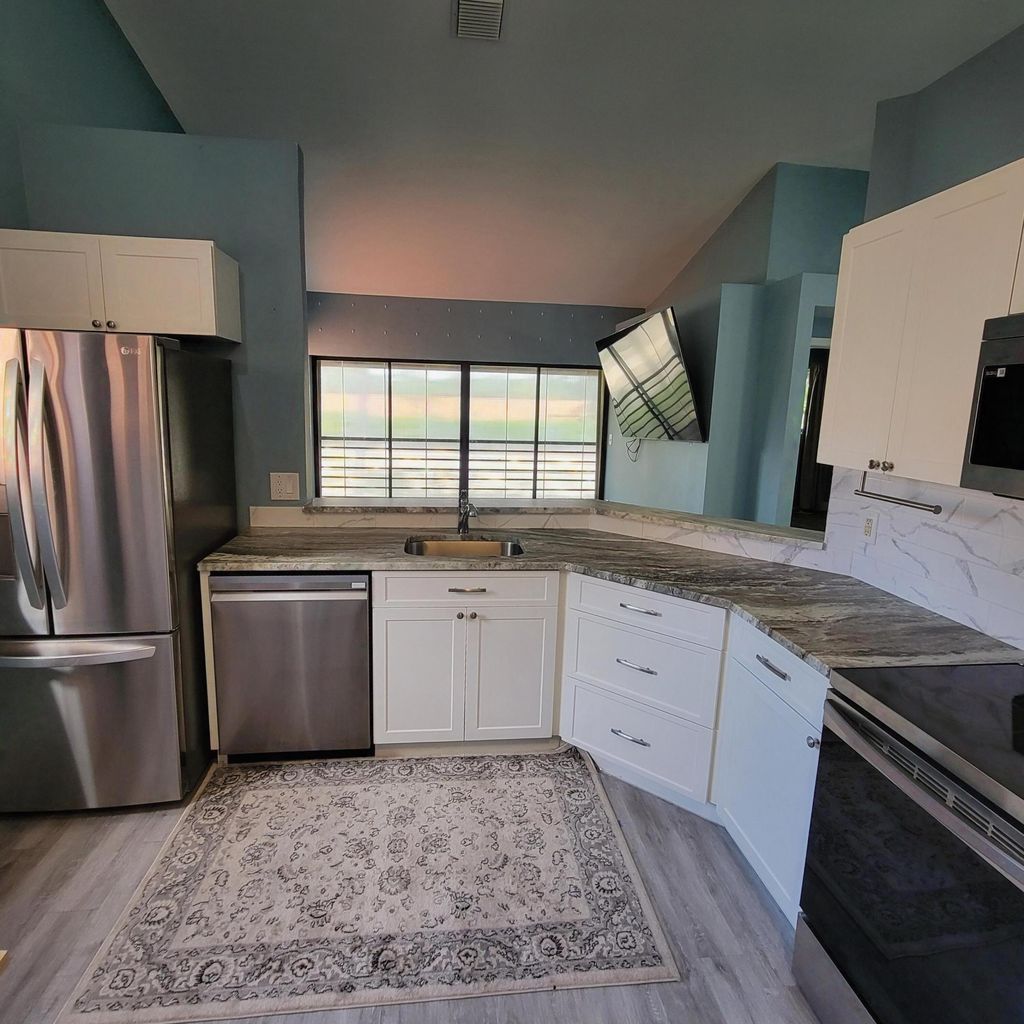 Photo of 4 Via De Casas Sur #201, Boynton Beach, FL 33426 (MLS # R11120211)