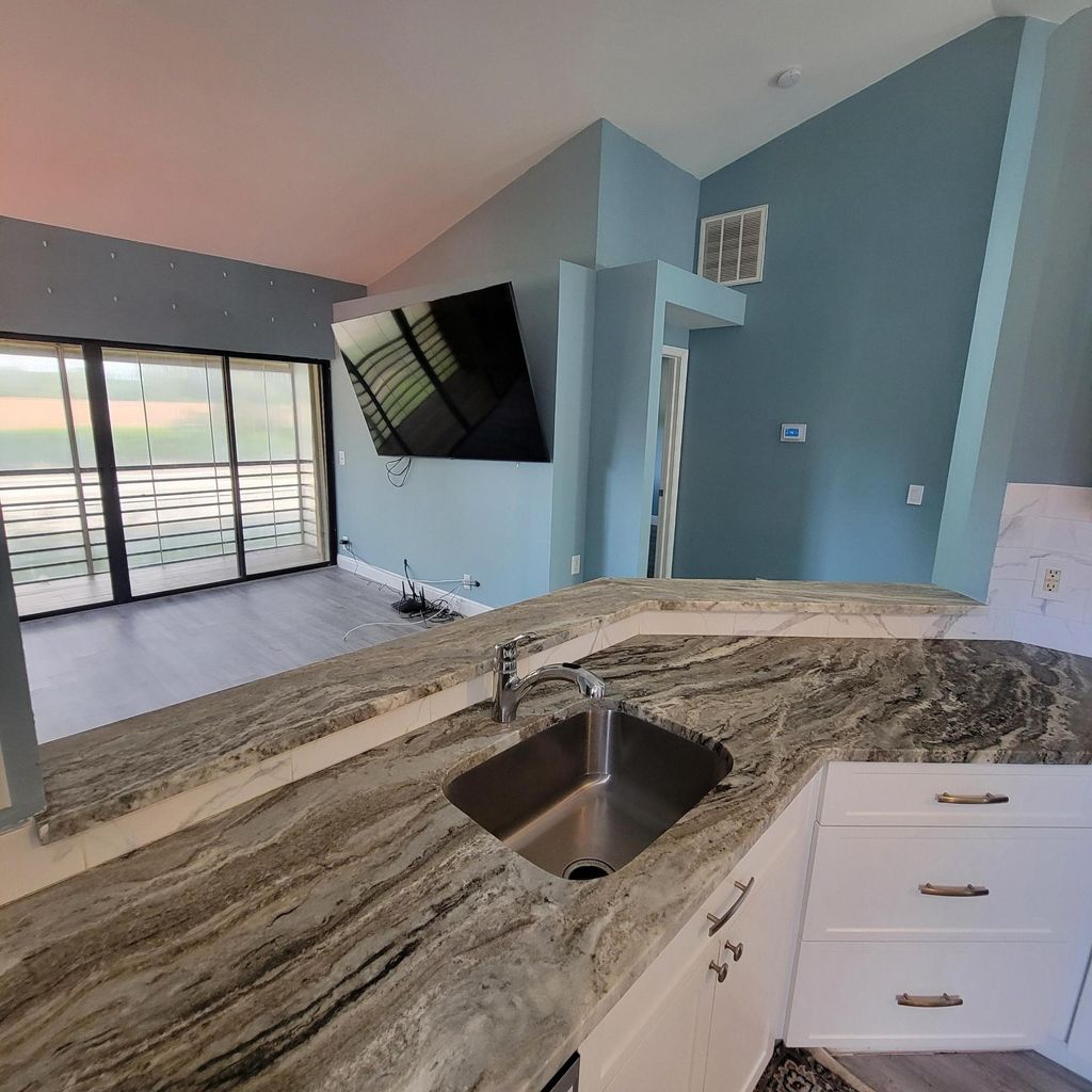 Photo of 4 Via De Casas Sur #201, Boynton Beach, FL 33426 (MLS # R11120211)