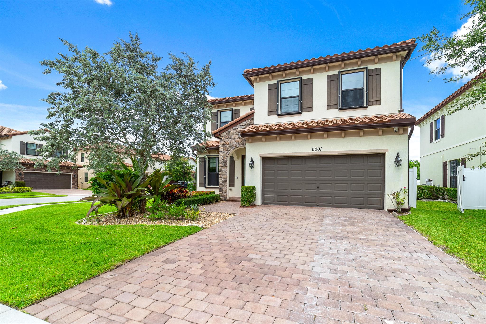 Welcome to 6001 Night Heron Ct, Greenacres, FL 33415! This stunning 4-bedroom, 2 and a half bathroom home offers an open-plan living and dining area, a modern kitchen with stainless steel appliances, and a master suite with a walk-in closet and ensuite bathroom. Three additional bedrooms provide ample space Enjoy your private backyard and two-car garage. The home includes a separate laundry room with washer and dryer. Located in a peaceful neighborhood, you're minutes from shopping, dining, parks, and top-rated schools. Schedule a viewing today!