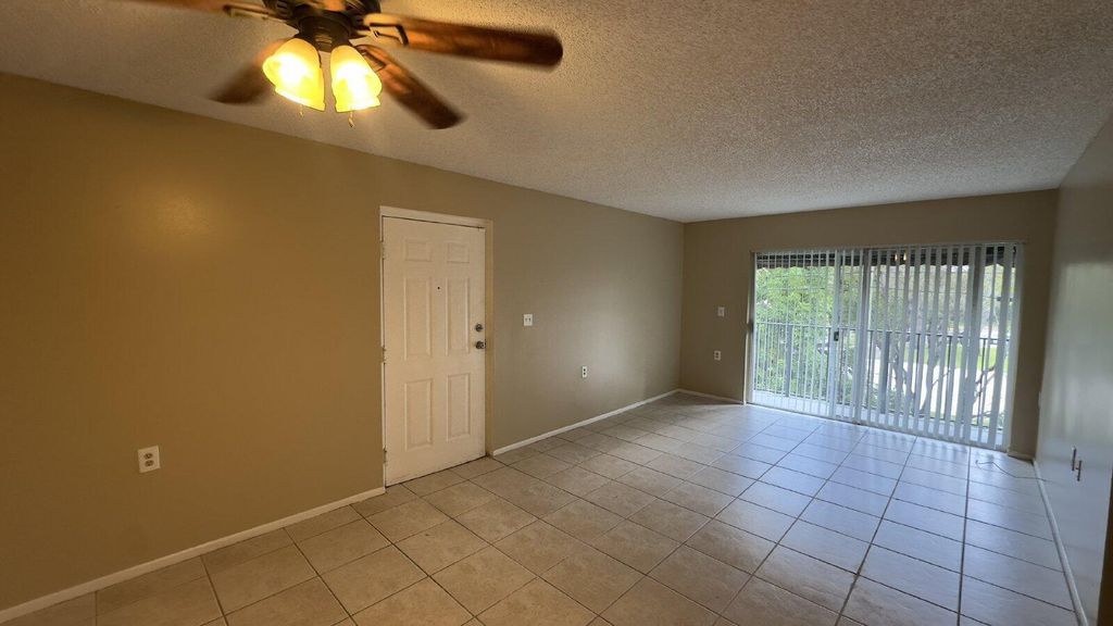 Photo of 1068 N Benoist Farms Road #307, West Palm Beach, FL 33411 (MLS # B26006666)