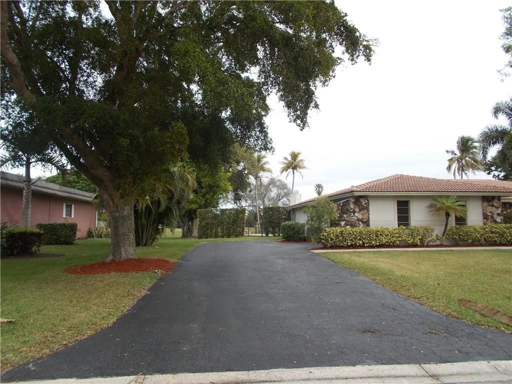 Photo of 11051 NW 24th Street, Coral Springs, FL 33065 (MLS # F10527524)
