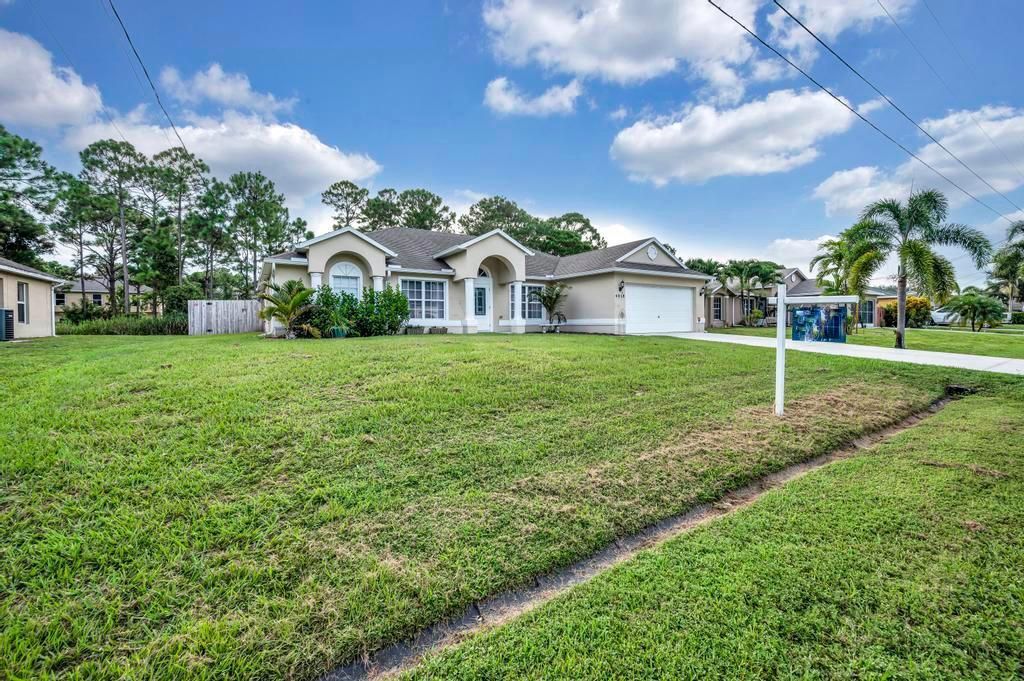 Photo of 4018 SW Hablow Street, Port Saint Lucie, FL 34953 (MLS # R10738212)