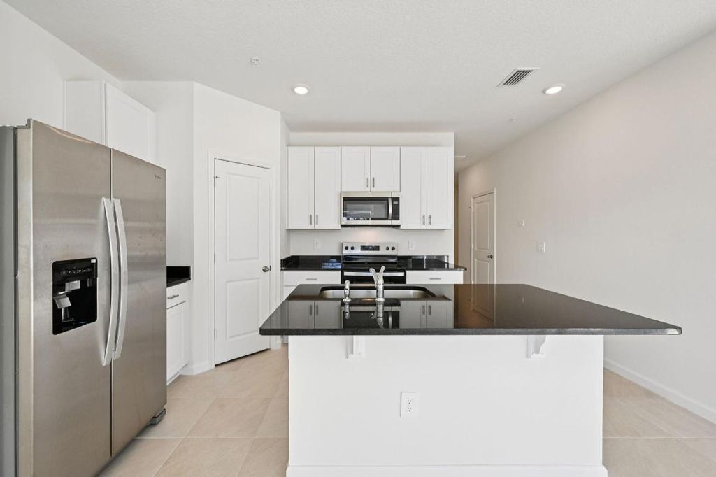 Photo of 617 Salisbury Circle, Fort Pierce, FL 34982 (MLS # R11152437)