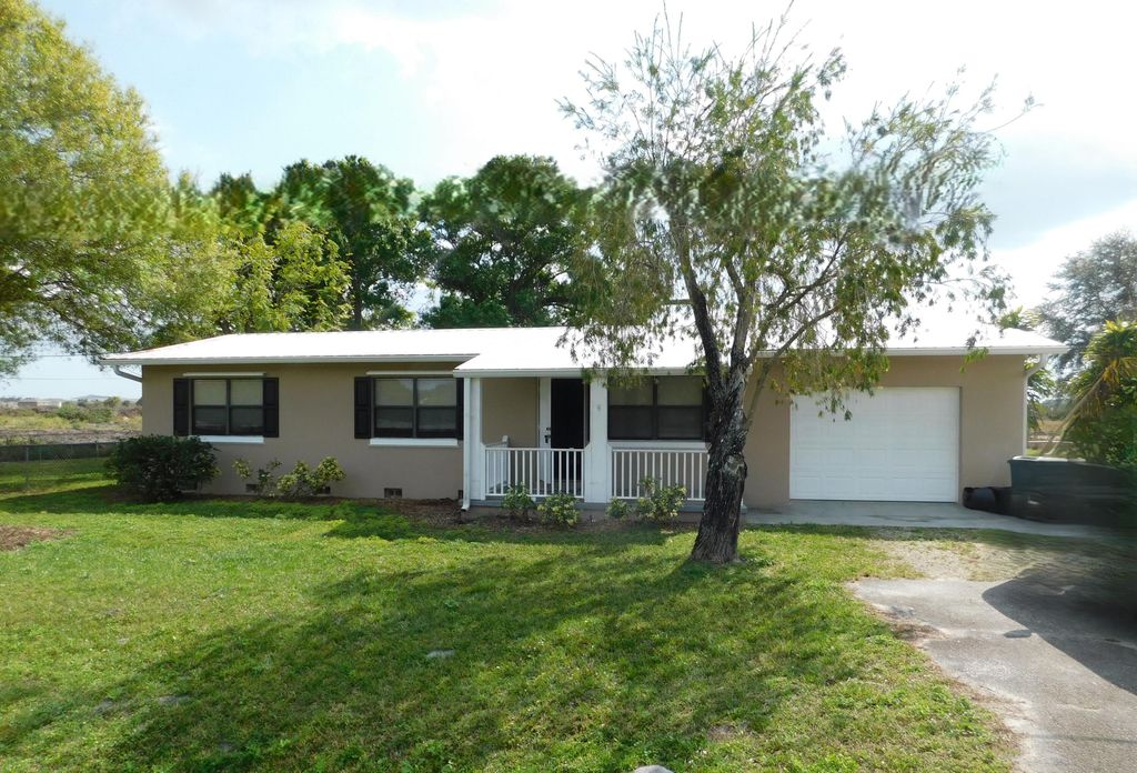 Photo of 10115 Okeechobee Road, Fort Pierce, FL 34945 (MLS # R11059075)