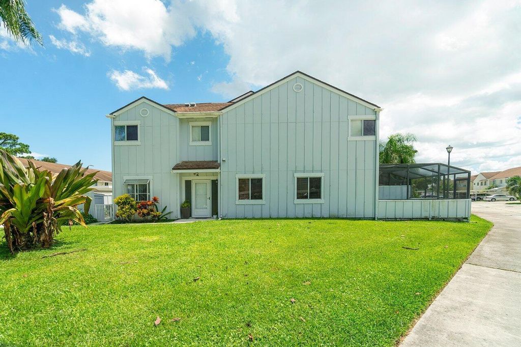 Photo of 6167 Riverwalk Lane #6, Jupiter, FL 33458 (MLS # R10912042)