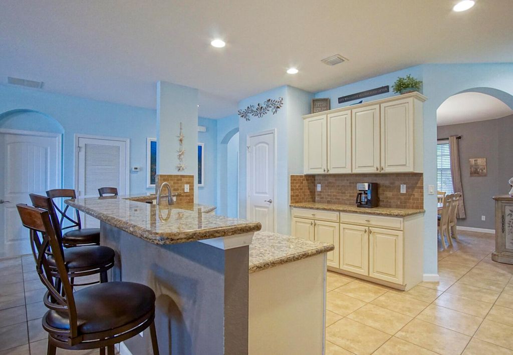 Photo of 1908 NW Waterwillow Way, Jensen Beach, FL 34957 (MLS # R10942432)