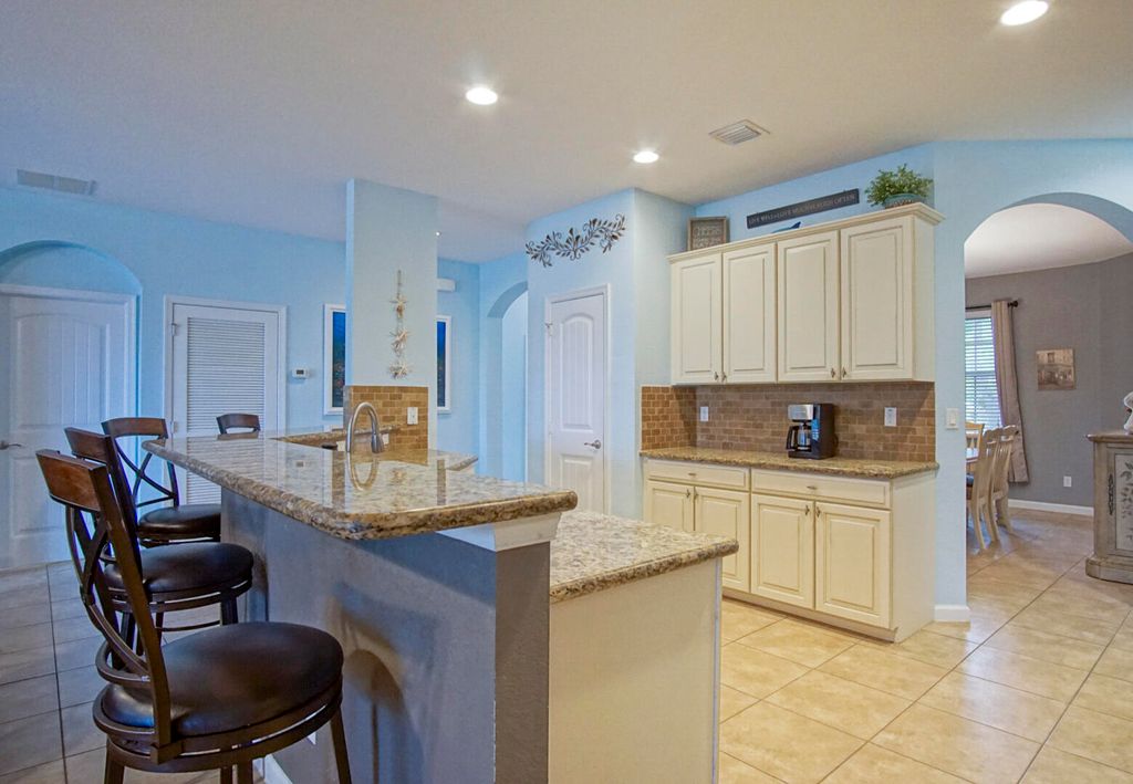 Photo of 1908 NW Waterwillow Way, Jensen Beach, FL 34957 (MLS # R10942432)