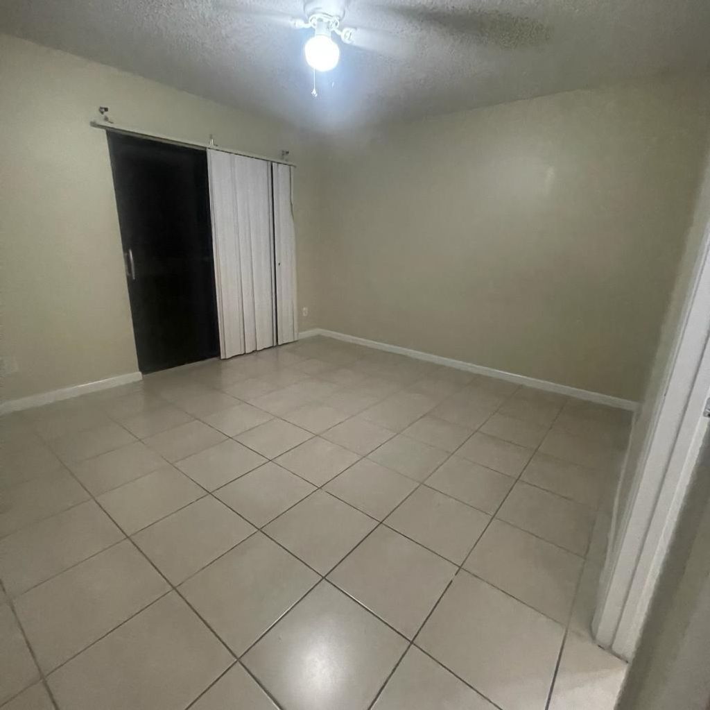 Photo of 1304 Riverside Drive, Greenacres, FL 33463 (MLS # R10944943)