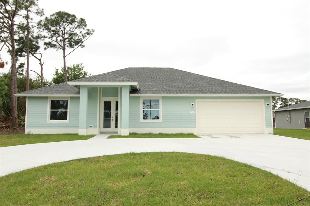 Photo of 920 SW Del Rio Boulevard, Port Saint Lucie, FL 34953 (MLS # R10697331)