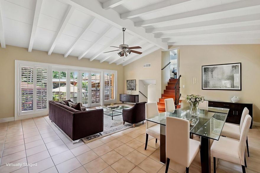 Rare Opportunity in East Wilton Manors — 2,000+ SQ FT at an Unmatched Value. A major price reduction makes this architect-designed tri-level one of the best buys in the area—opportunities like this are limited and move fast. This striking home offers 3 spacious bedrooms, 3 baths, soaring vaulted ceilings, and dramatic walls of glass that flood the space with natural light. Full impact windows and doors add security and efficiency. The updated primary suite delivers modern comfort, while separate living and family rooms provide flexibility for today's lifestyle. Situated on an oversized lot with room for a pool, this property offers immediate livability with serious upside. Act fast—this is the one buyers wait for.