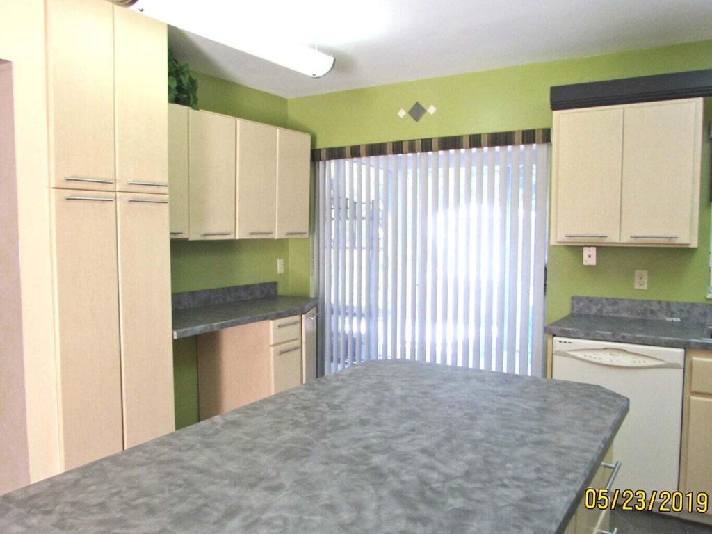 Photo of 734 SE Arton Lane, Port Saint Lucie, FL 34983 (MLS # R10998996)