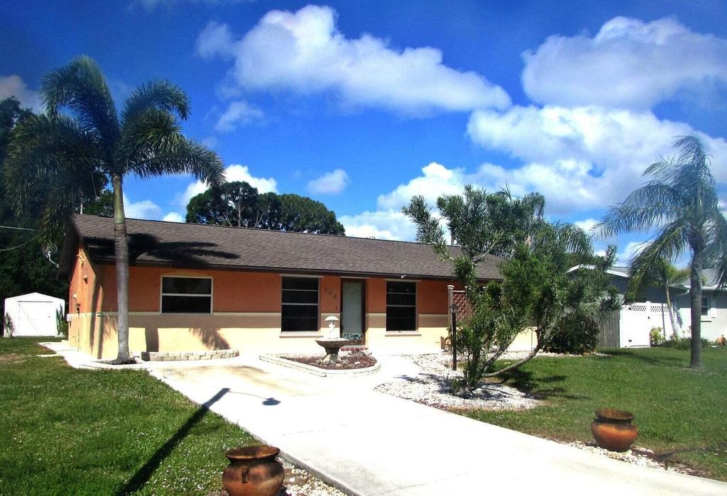 Photo of 734 SE Arton Lane, Port Saint Lucie, FL 34983 (MLS # R10998996)