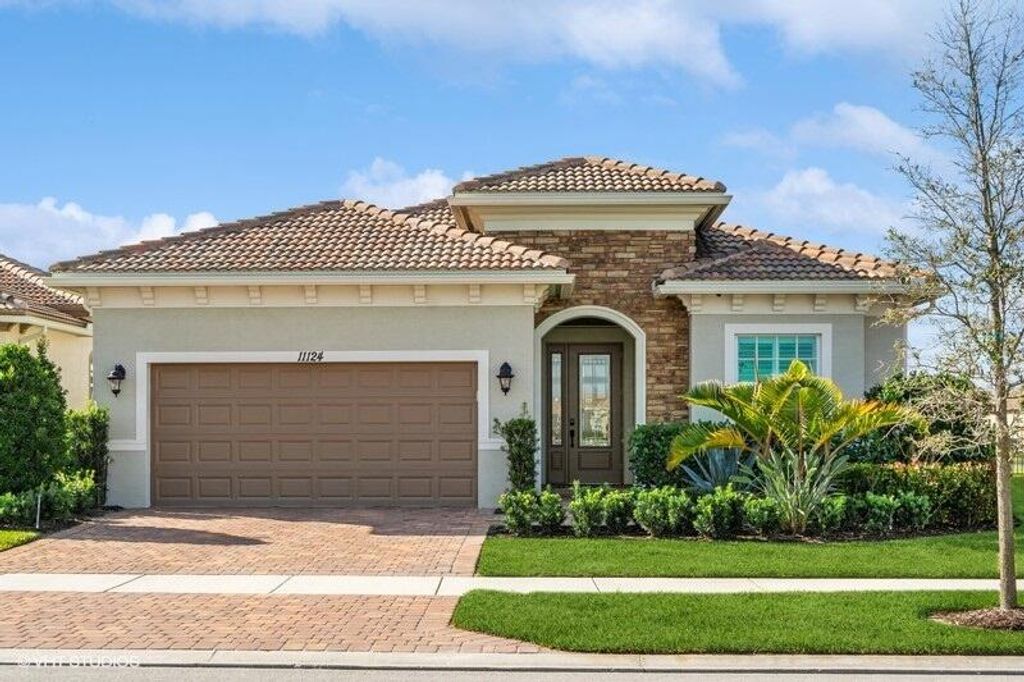 Photo of 11124 SW Lunata Way, Port Saint Lucie, FL 34987 (MLS # R10951785)