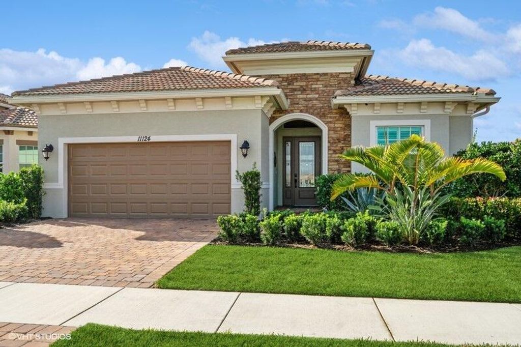 Photo of 11124 SW Lunata Way, Port Saint Lucie, FL 34987 (MLS # R10951785)