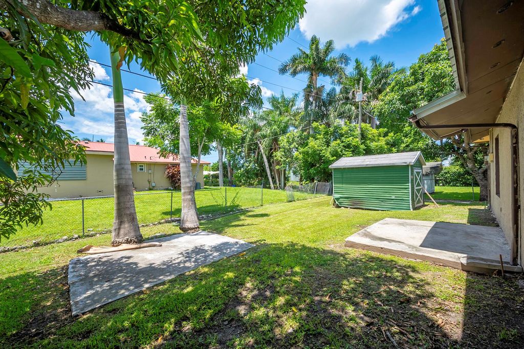 Photo of 612 SW 11th Street, Belle Glade, FL 33430 (MLS # R11007403)